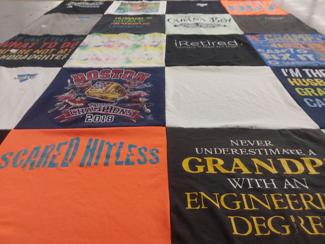 T-shirt quilt with sports, family themes by Patti from ME