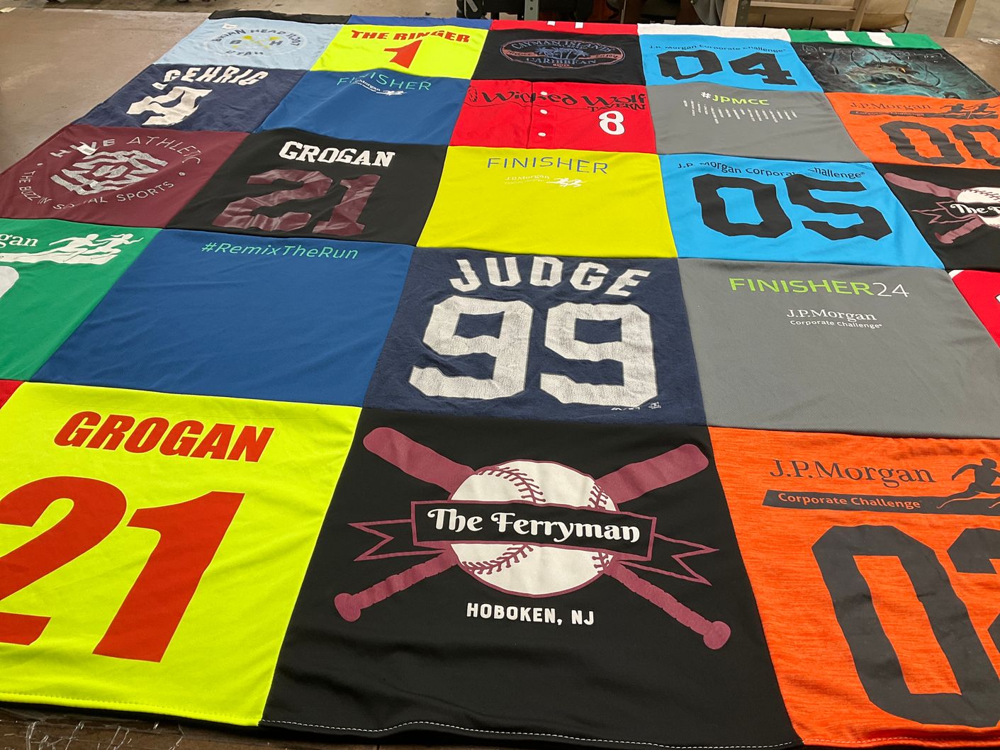 T-shirt quilt with sports, running themes by Chris from NJ