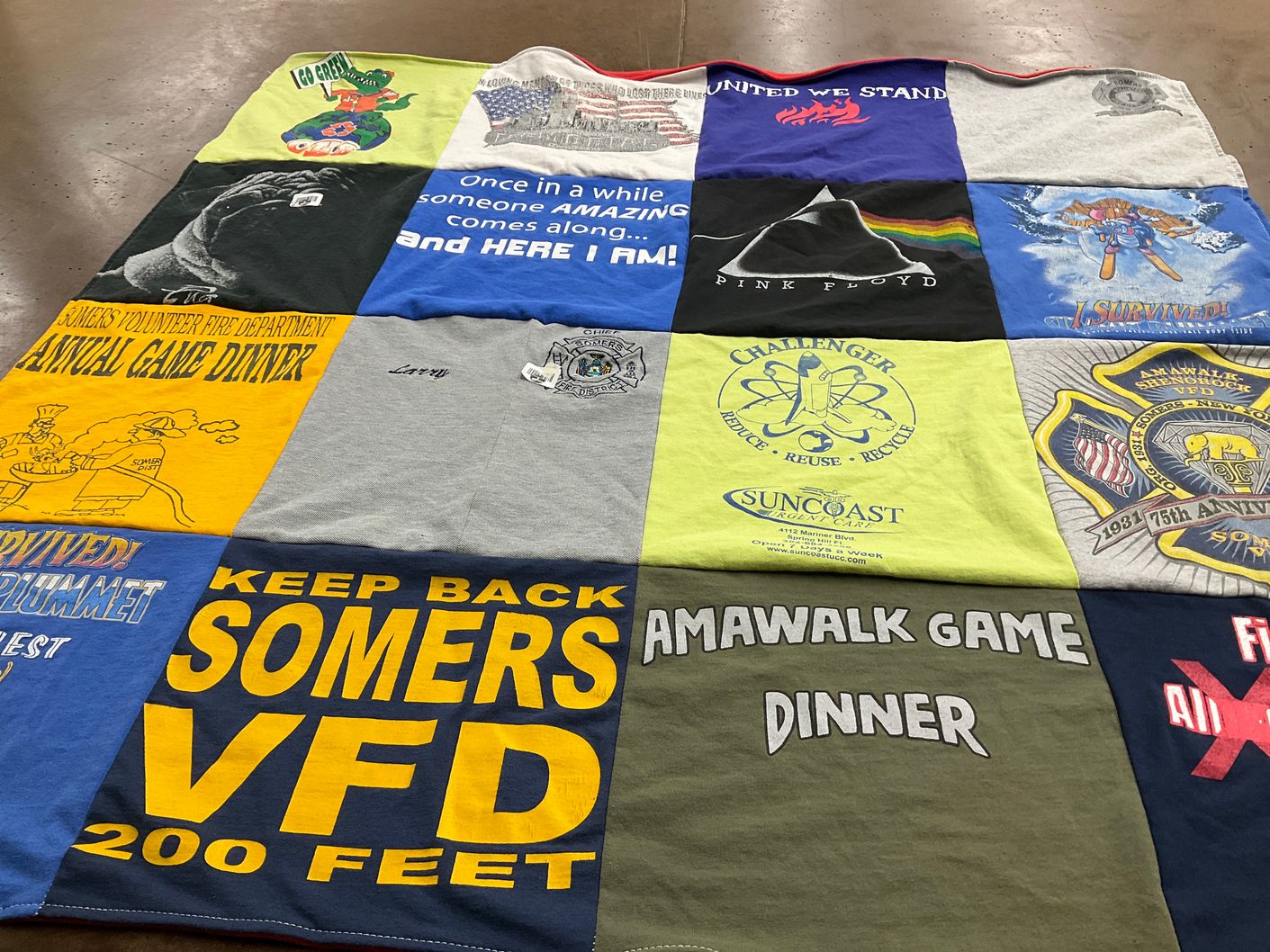 T-shirt quilt with fire department, local events themes by Lynne from FL