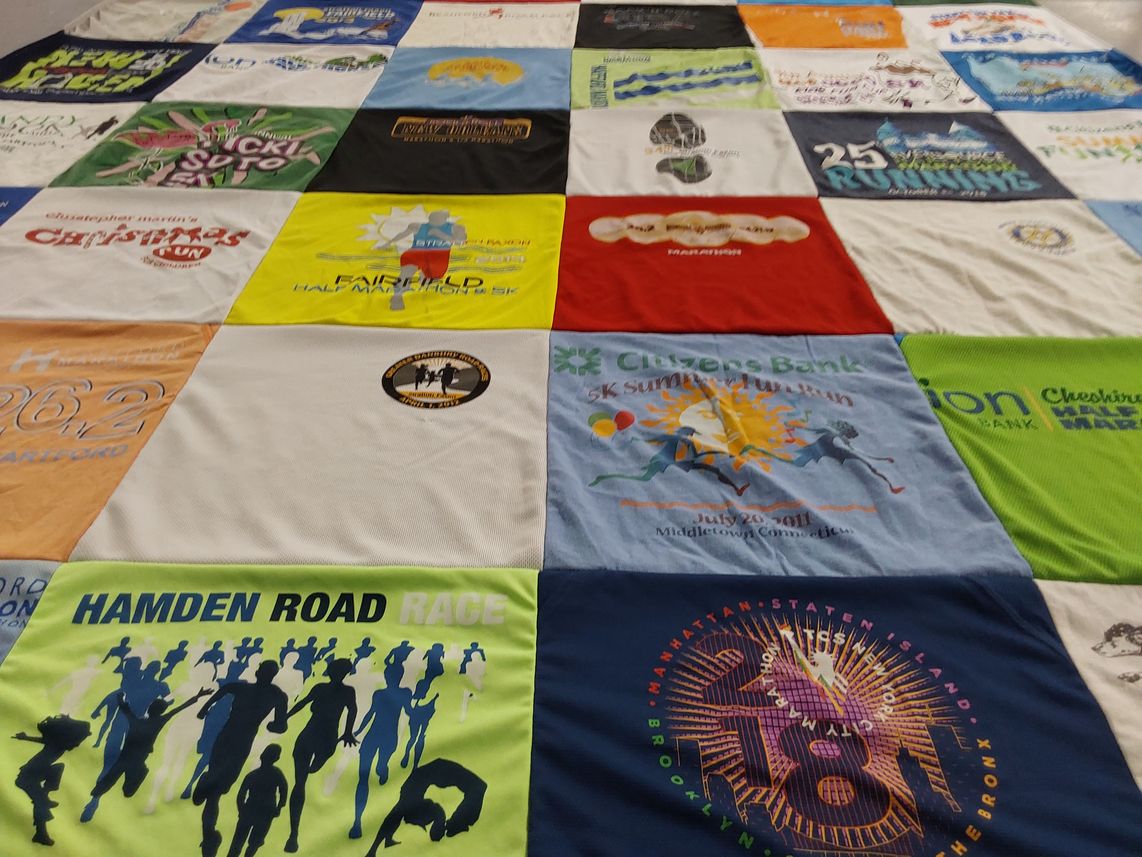 T-shirt quilt with running, marathons themes by Carrie from CT