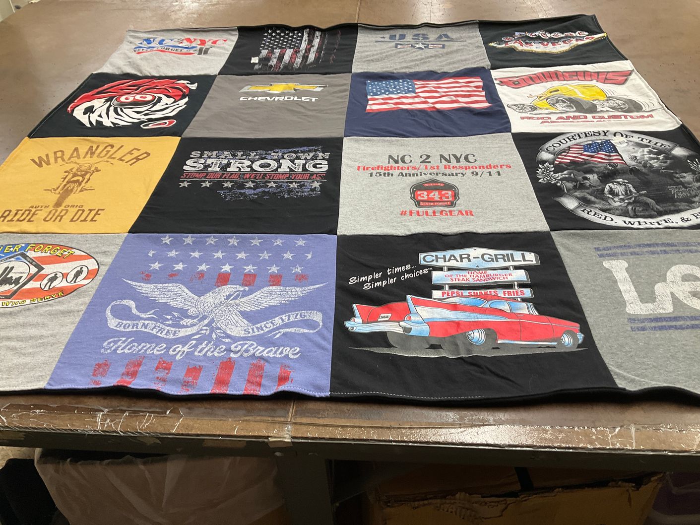 T-shirt quilt with firefighters, automobiles themes by Margaret from NC