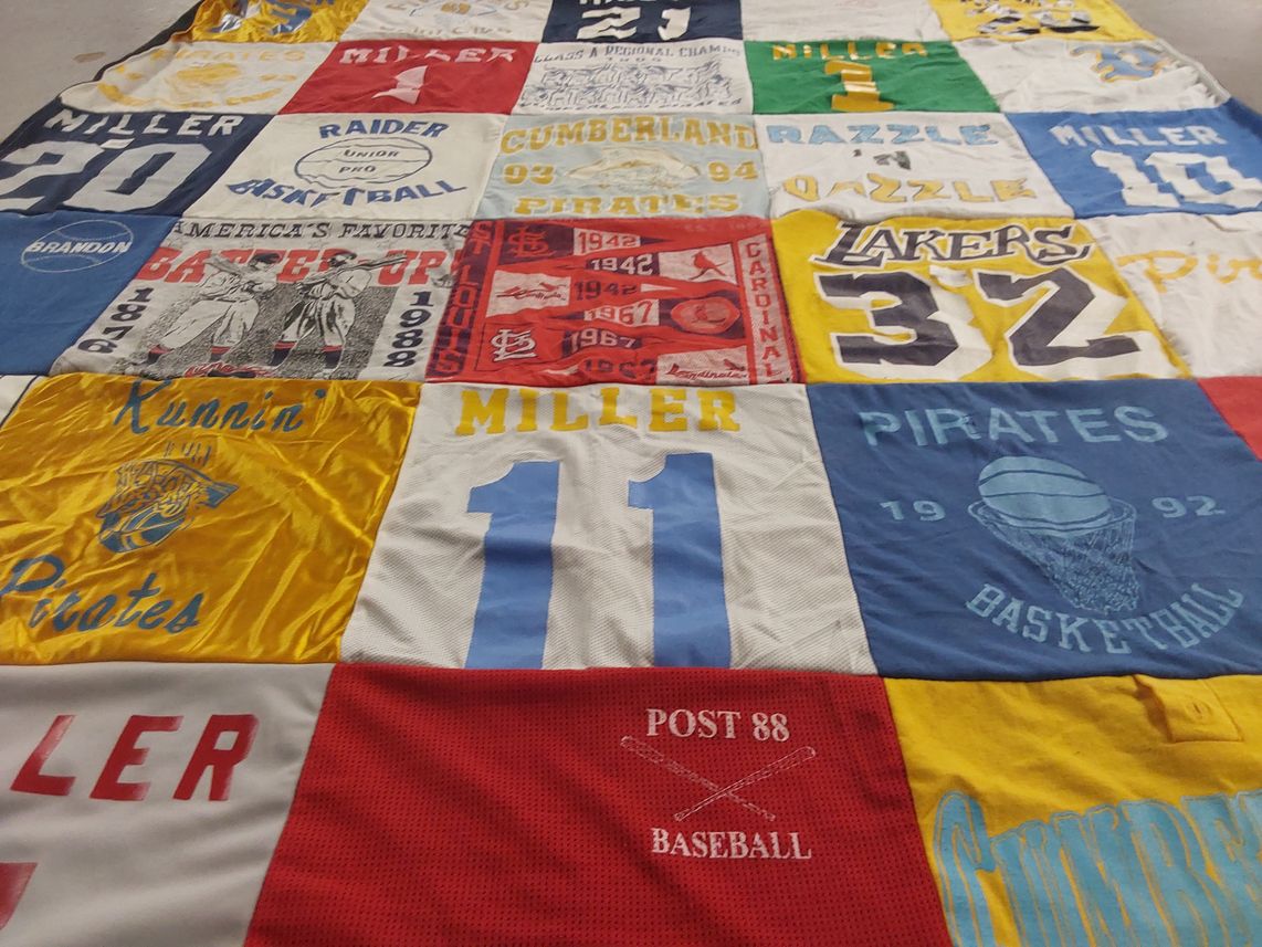 T-shirt quilt featuring pirates, lakers by Brandon from IL