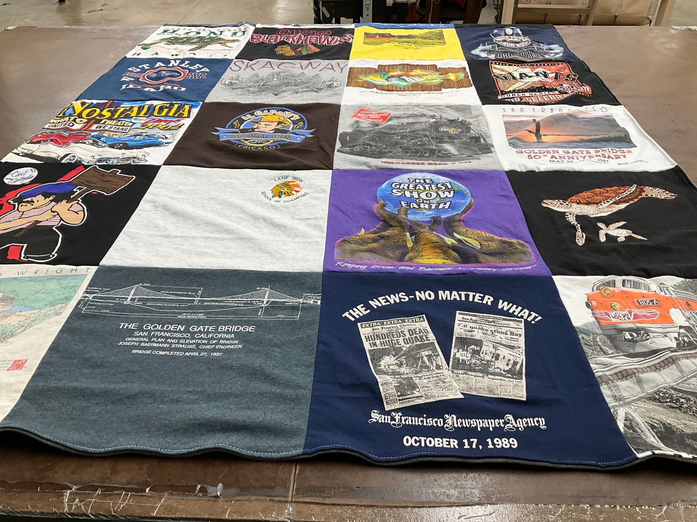 T-shirt quilt with travel, history themes by Sandy from NC