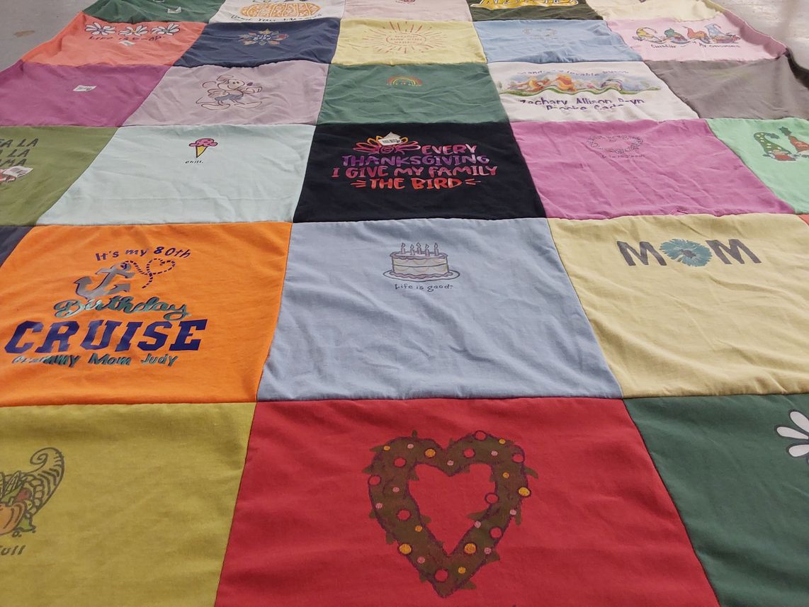 T-shirt quilt with family, celebrations themes by Amy from MD