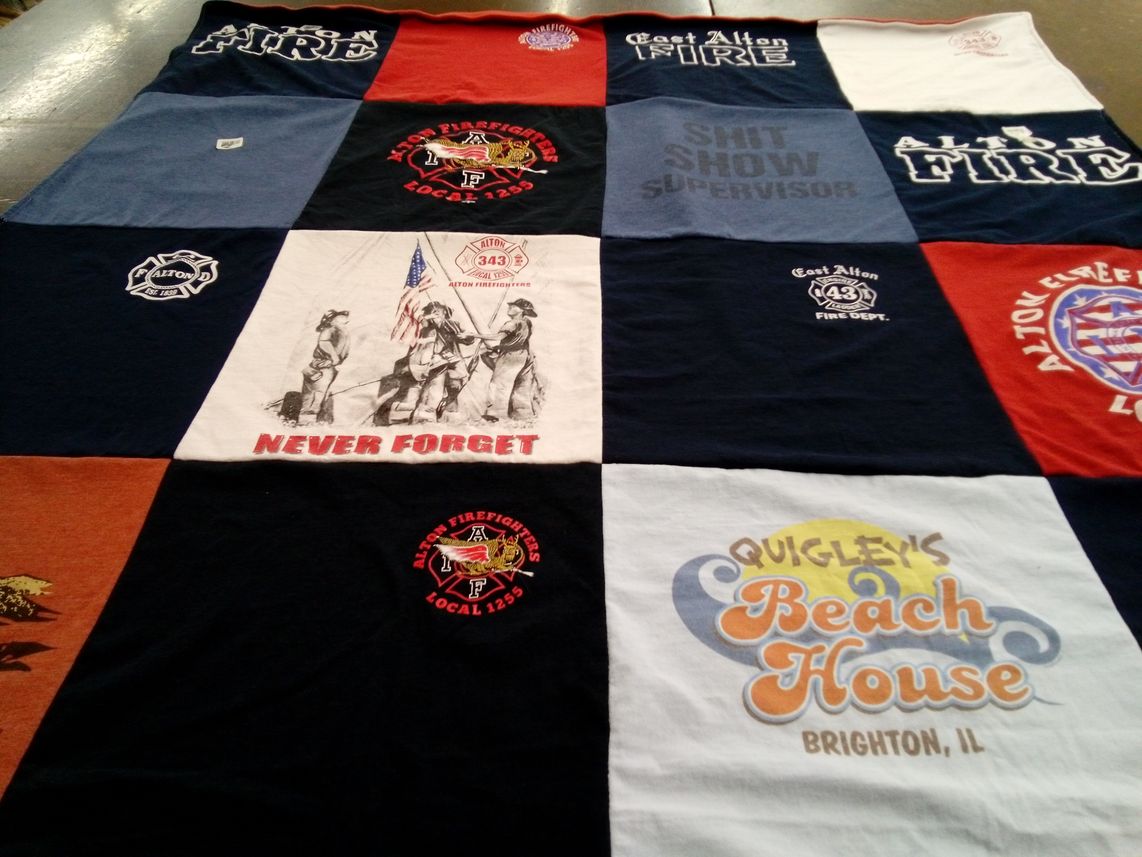 T-shirt quilt with firefighter, firefighting themes by Debbie from IL