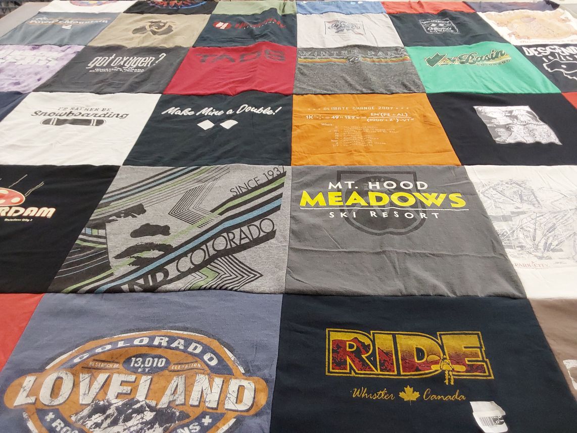 T-shirt quilt with snowboarding, skiing themes by Brian from VA