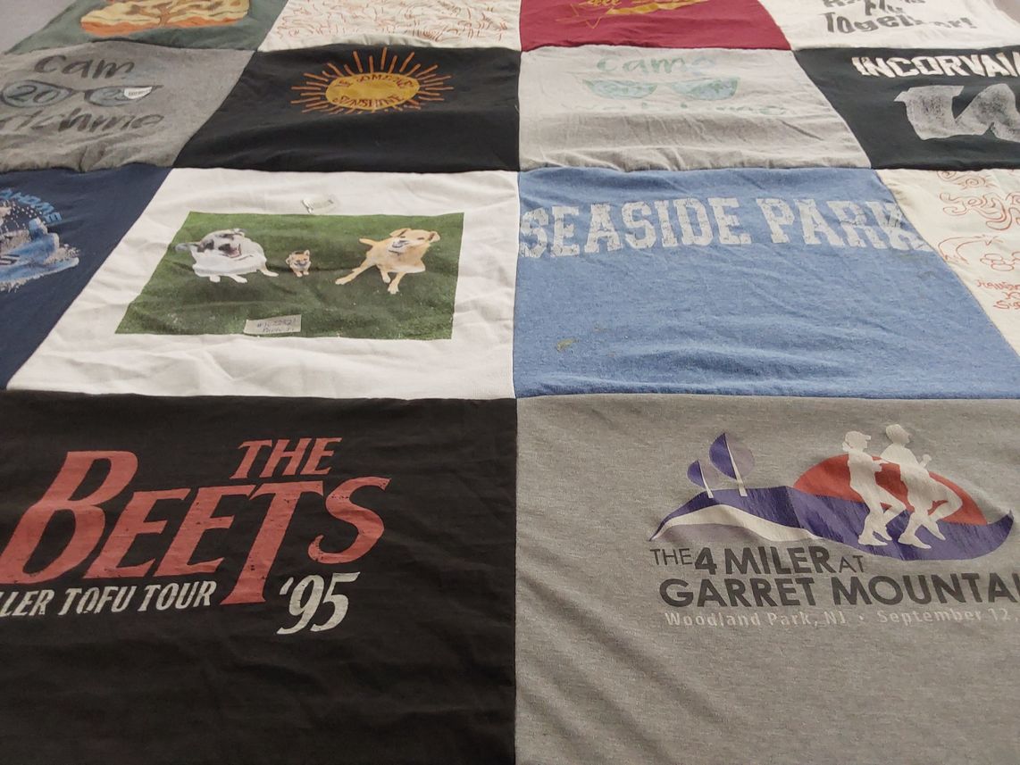 T-shirt quilt with dogs, running themes by Nina from CO