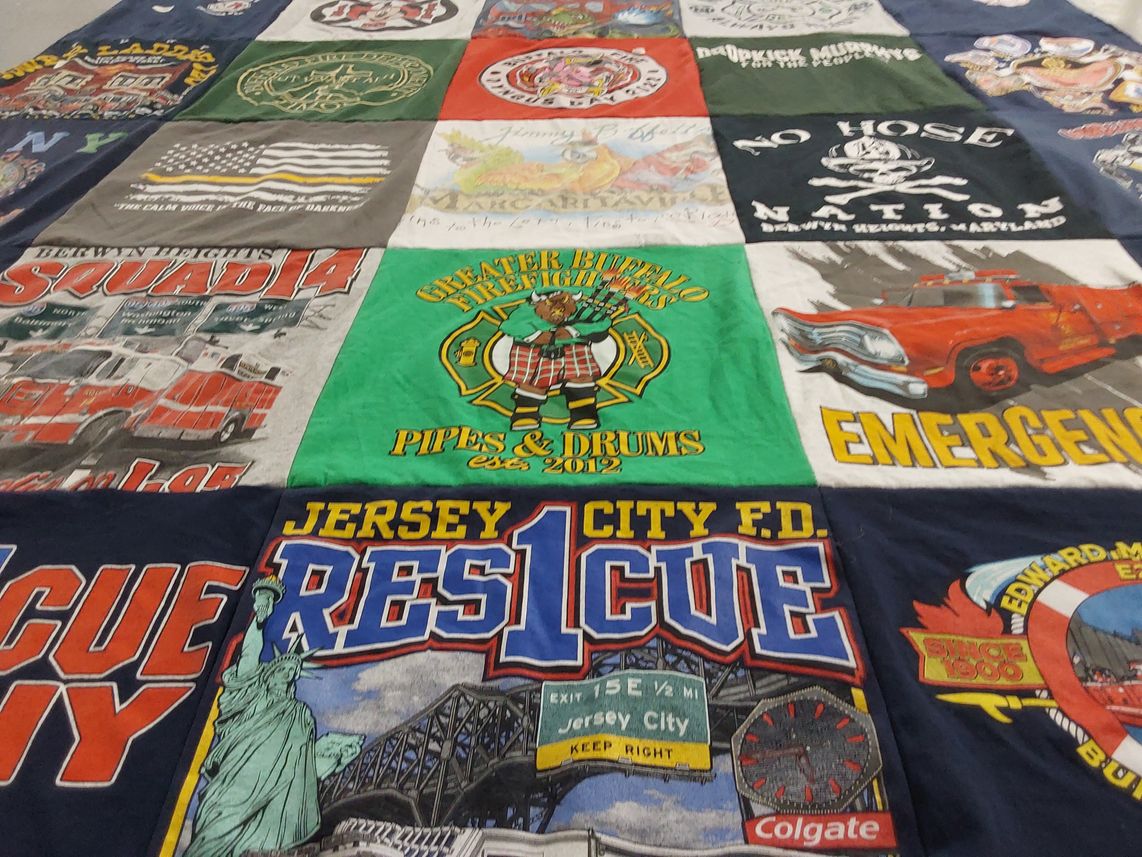 T-shirt quilt with firefighting, public safety themes by Allison from NY