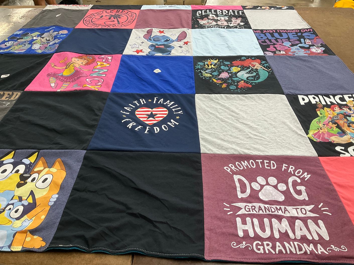 T-shirt quilt with cartoons, animals themes by Joan from NY