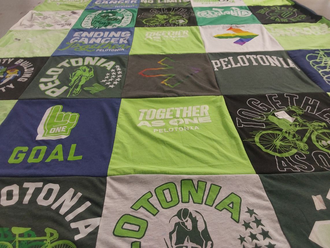 T-shirt quilt with cycling, fundraising themes by Deborah from OH
