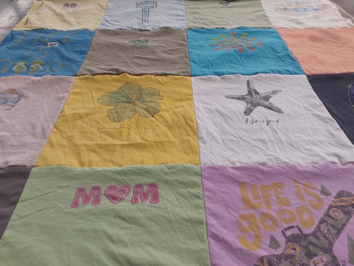 T-shirt quilt with music, family themes by Nancy from FL