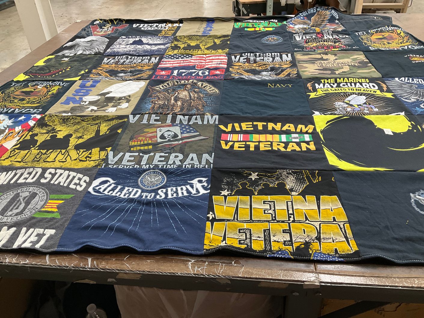 T-shirt quilt with military, history themes by EARLENE from PA