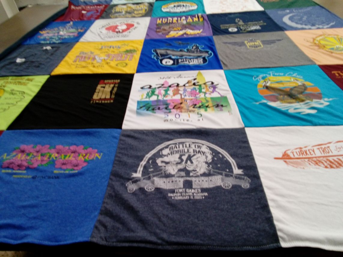 T-shirt quilt with running, athletics themes by Janet from AL