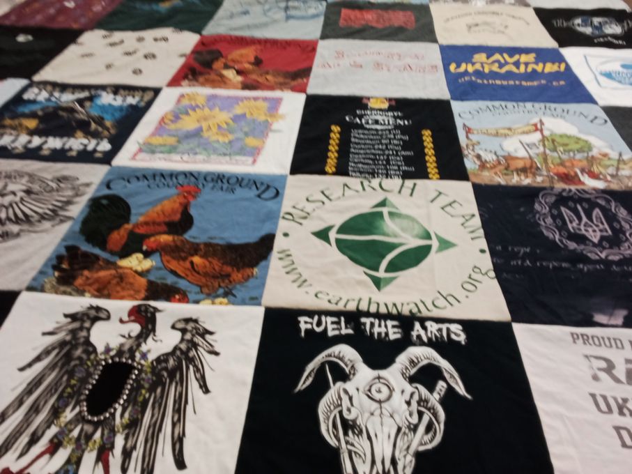 T-shirt quilt with environmental conservation, community support themes by Kathryn from ME
