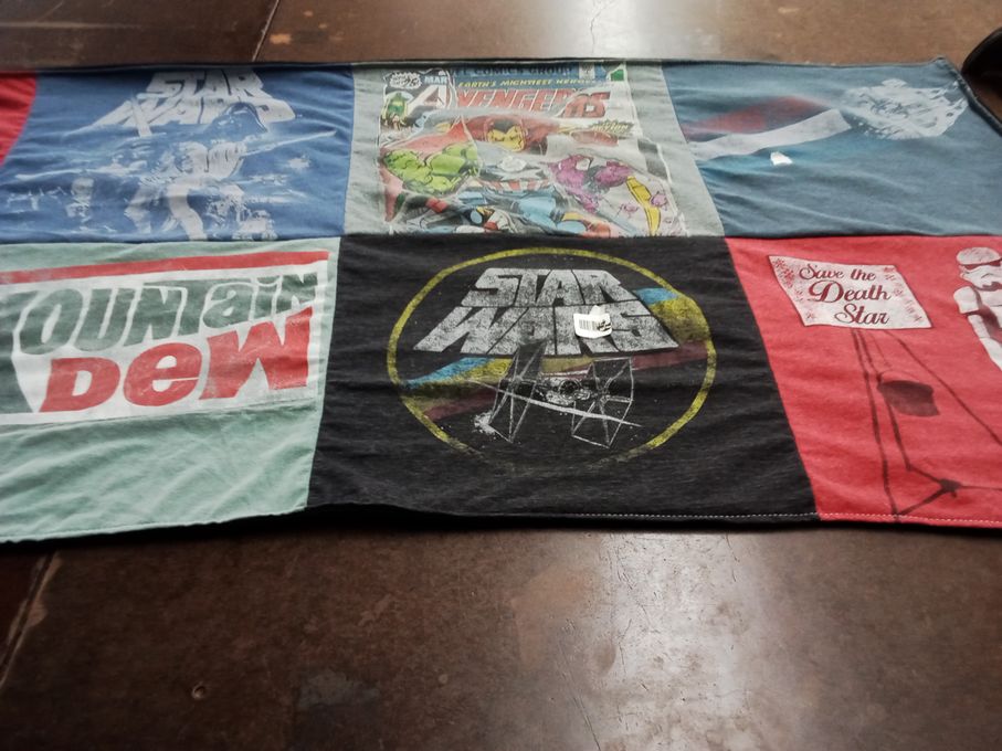 T-shirt quilt with science fiction, comics themes by Marisa from CA
