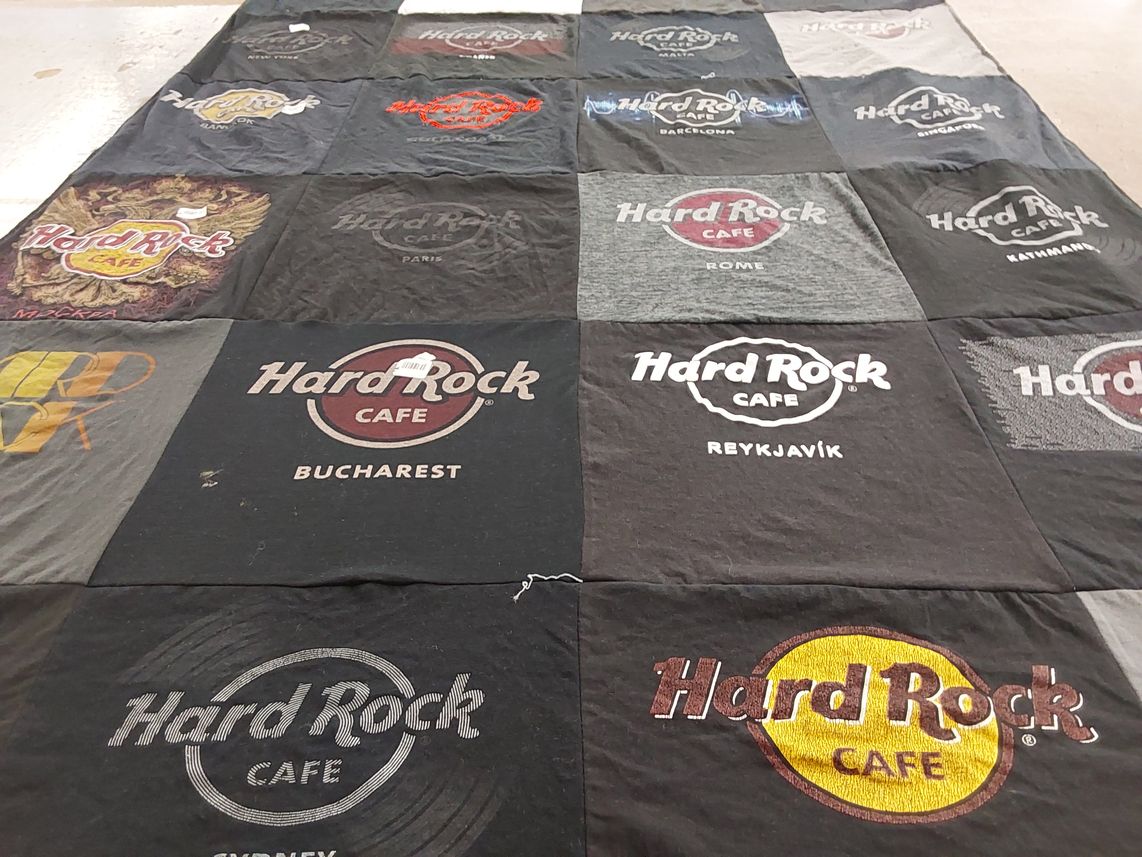 T-shirt quilt with music, travel themes by Kathryn from UT