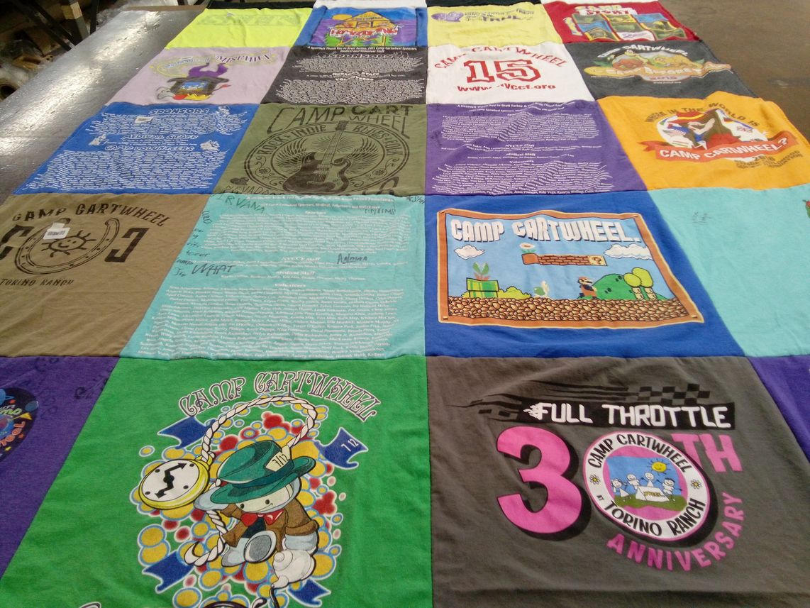 T-shirt quilt with camping, community themes by Sandra from NV