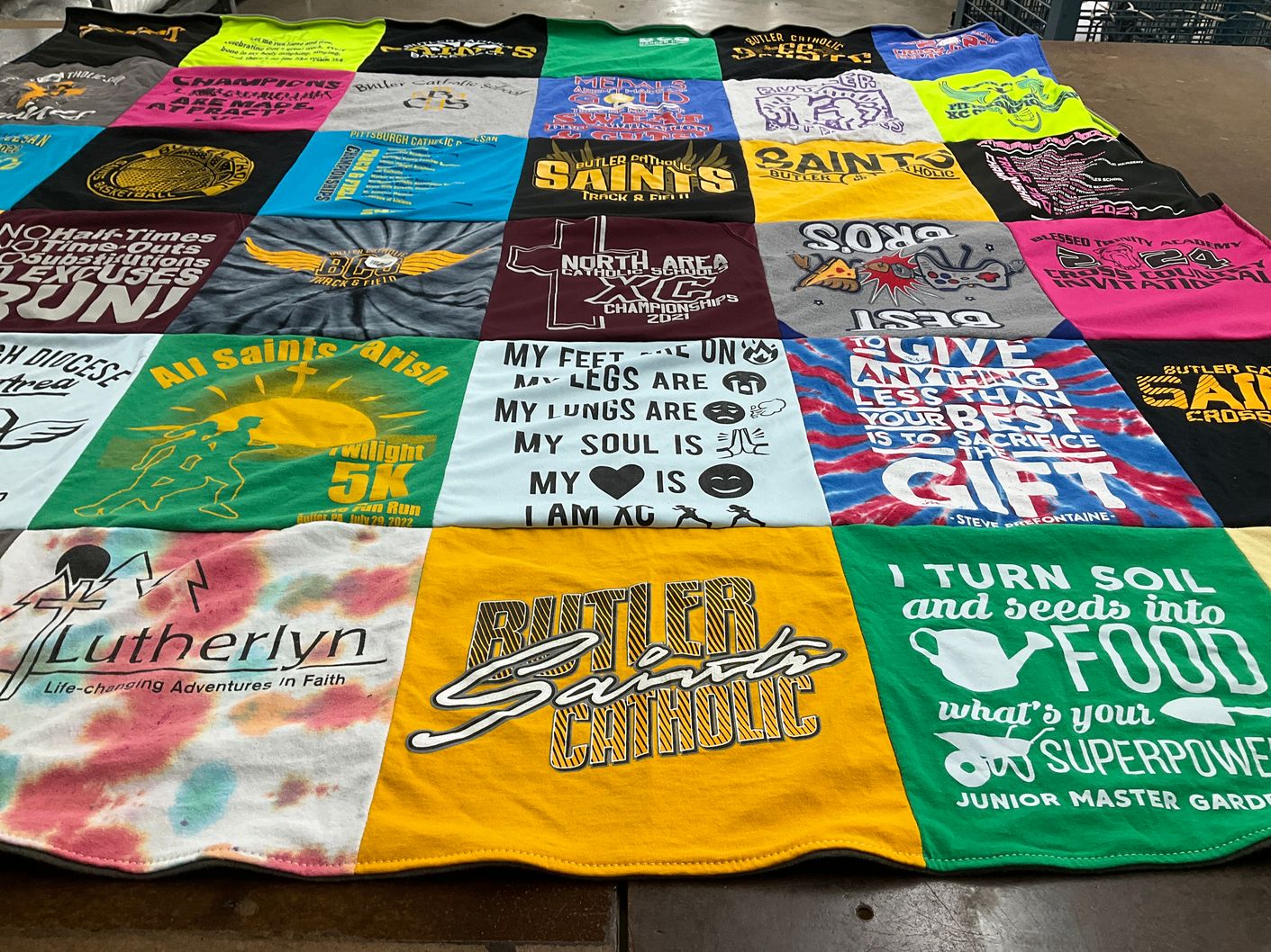 T-shirt quilt featuring butler saints cross country by Christina from PA