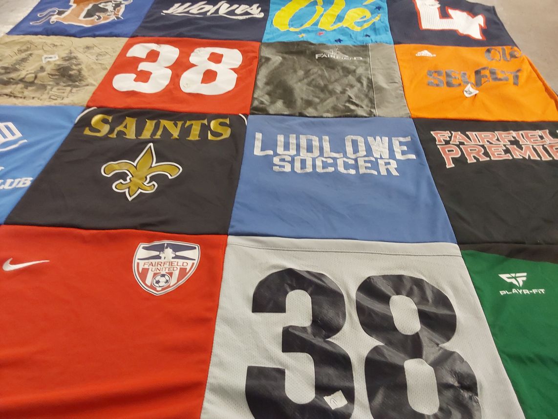 T-shirt quilt with soccer themes by Janice from CT