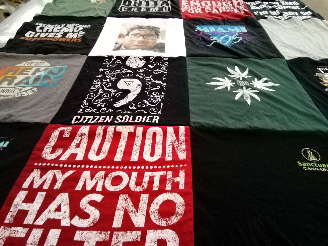 T-shirt quilt with cancer awareness, cannabis culture themes by Carolyn from FL