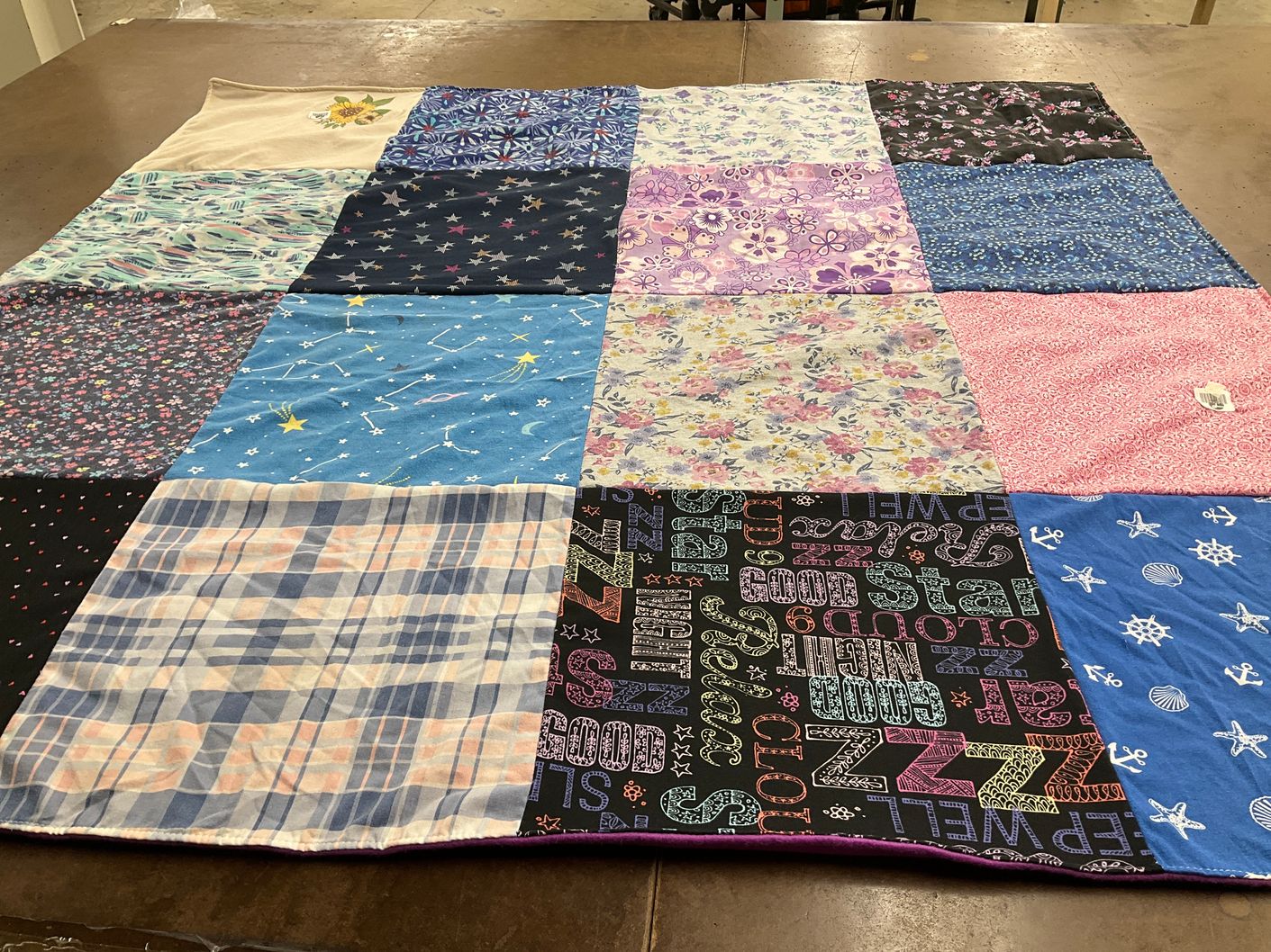 T-shirt quilt with astronomy, sleeping themes by Kimberly from NY