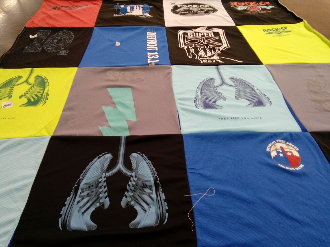 T-shirt quilt with running, fitness themes by April from MI