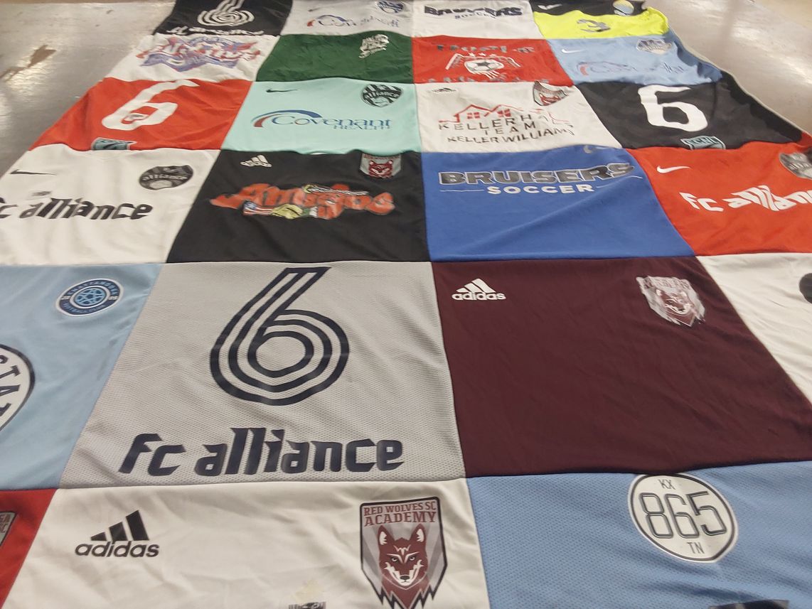 T-shirt quilt with soccer themes by Erin from TN