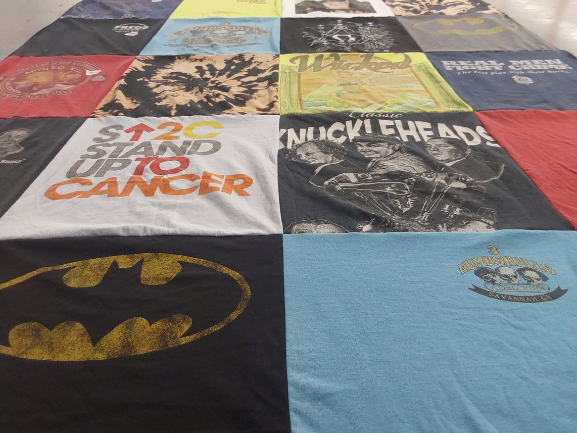 T-shirt quilt with comics, cancer awareness themes by CHERYL from FL