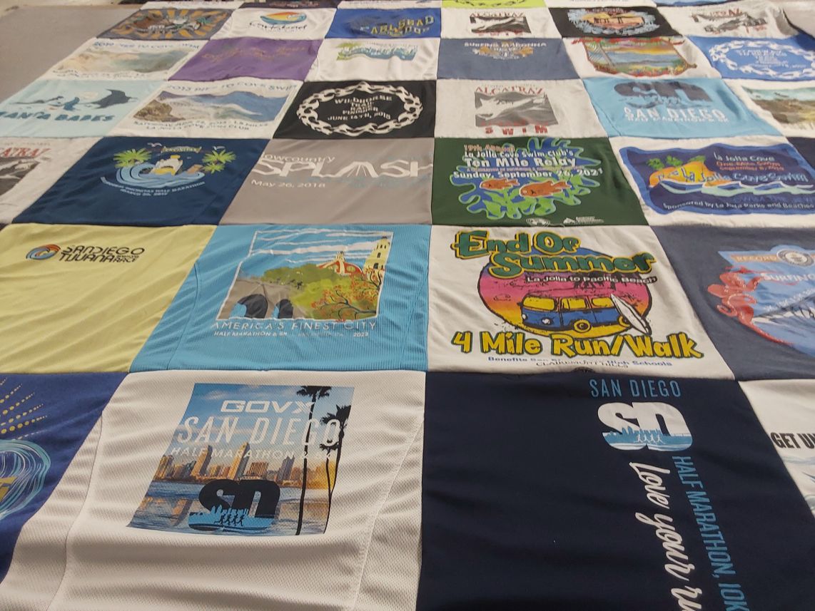 T-shirt quilt with running, events themes by Judith from CA