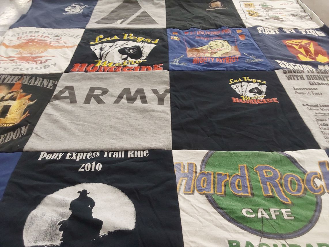 T-shirt quilt with military, travel themes by Kathy from NM