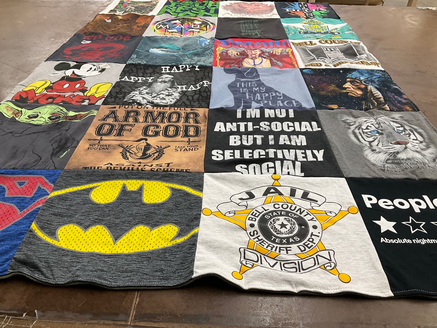 T-shirt quilt with pop culture, comic books themes by Gretchen from TX