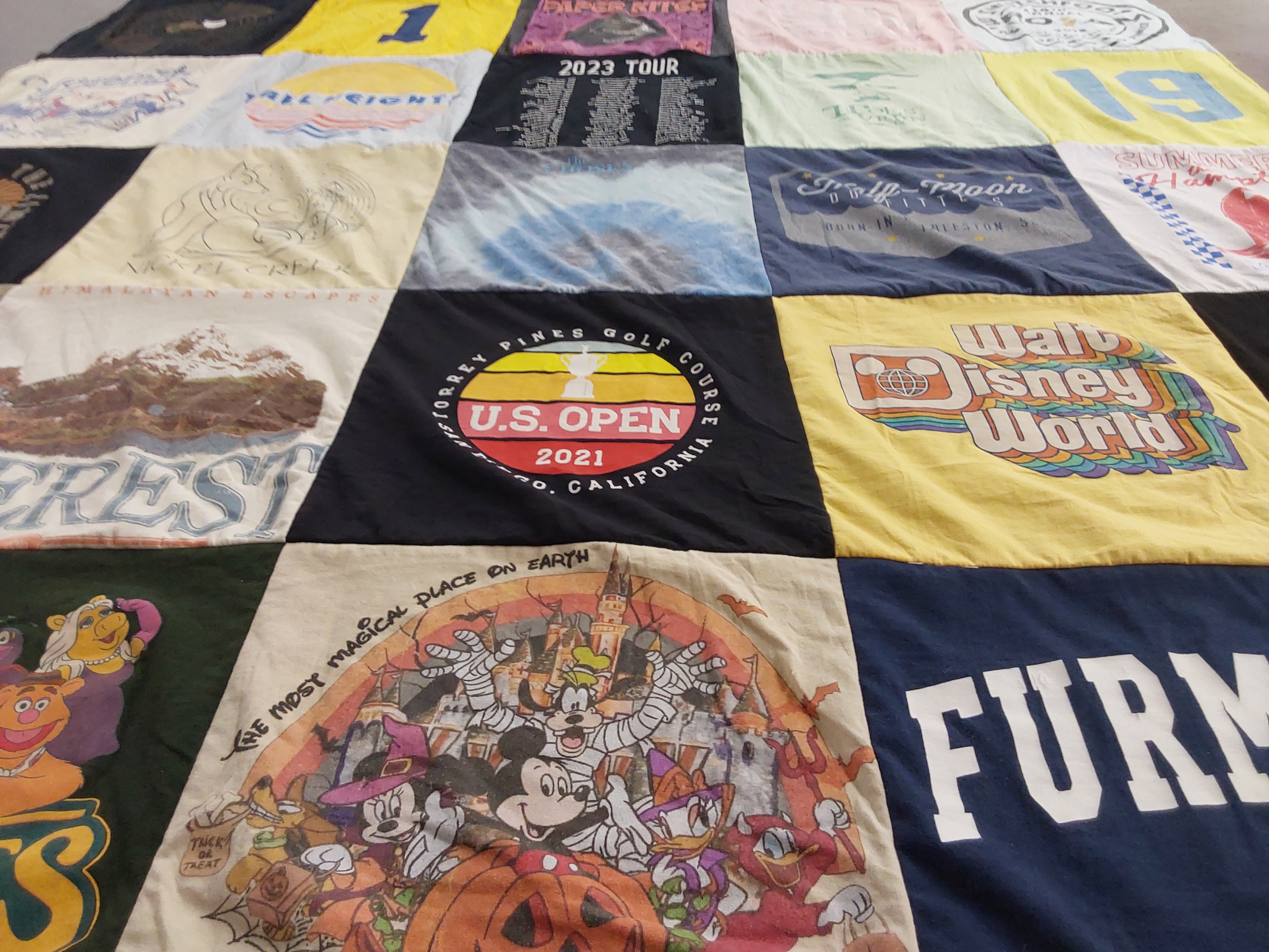 T-shirt quilt with disney, running themes by Amanda from CA