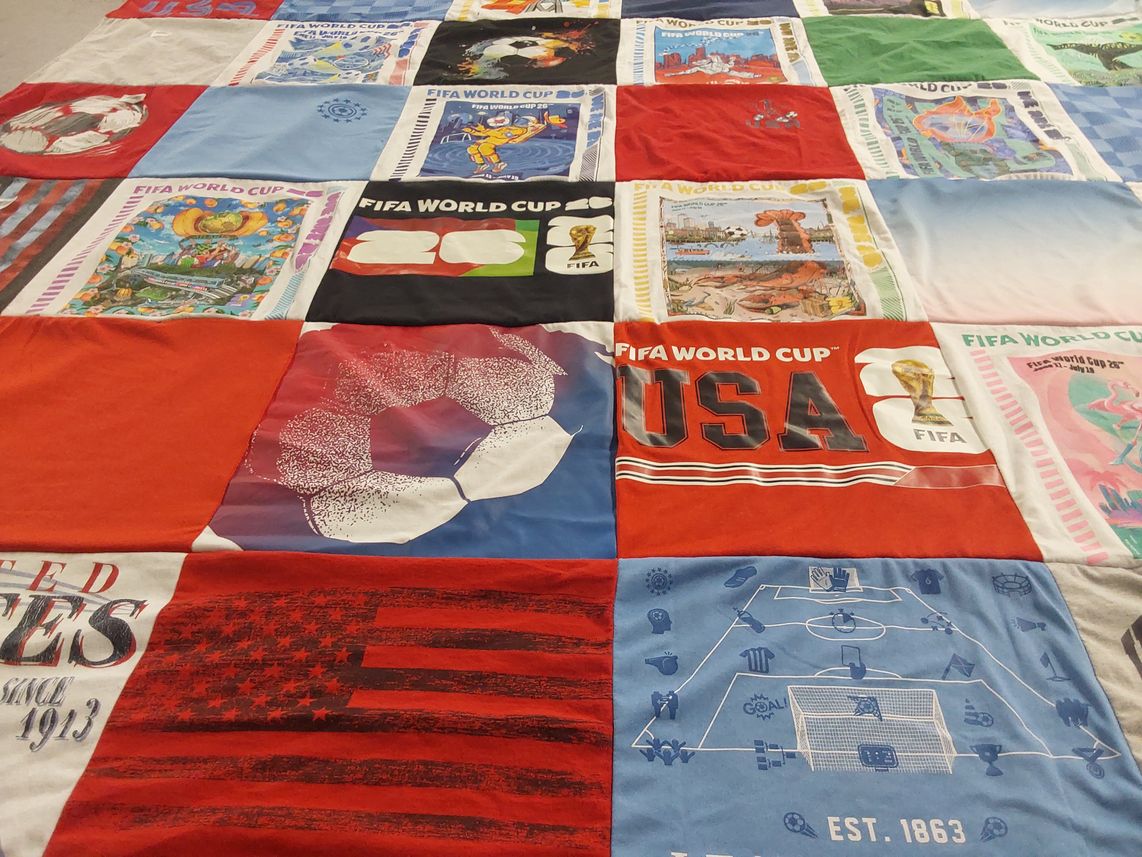T-shirt quilt with soccer, football themes by MacKenzie from FL