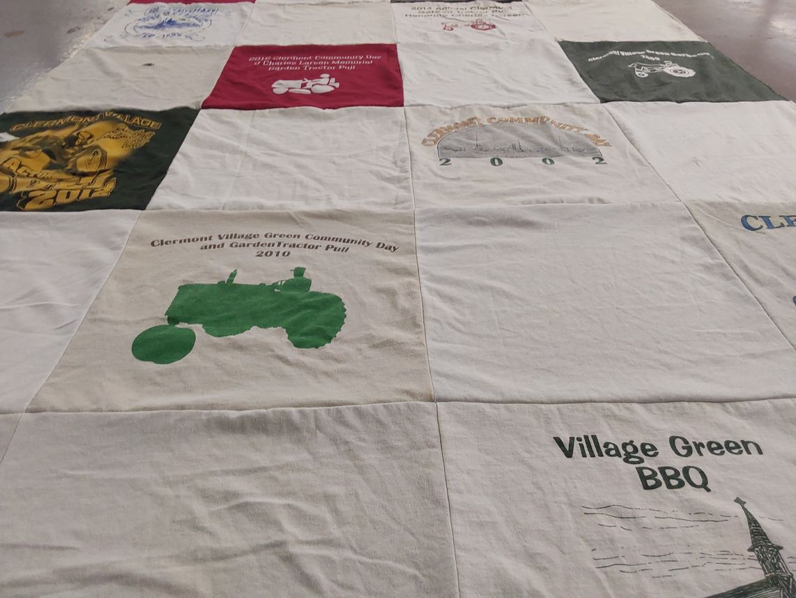 T-shirt quilt with community events, farming themes by Tamera from NY