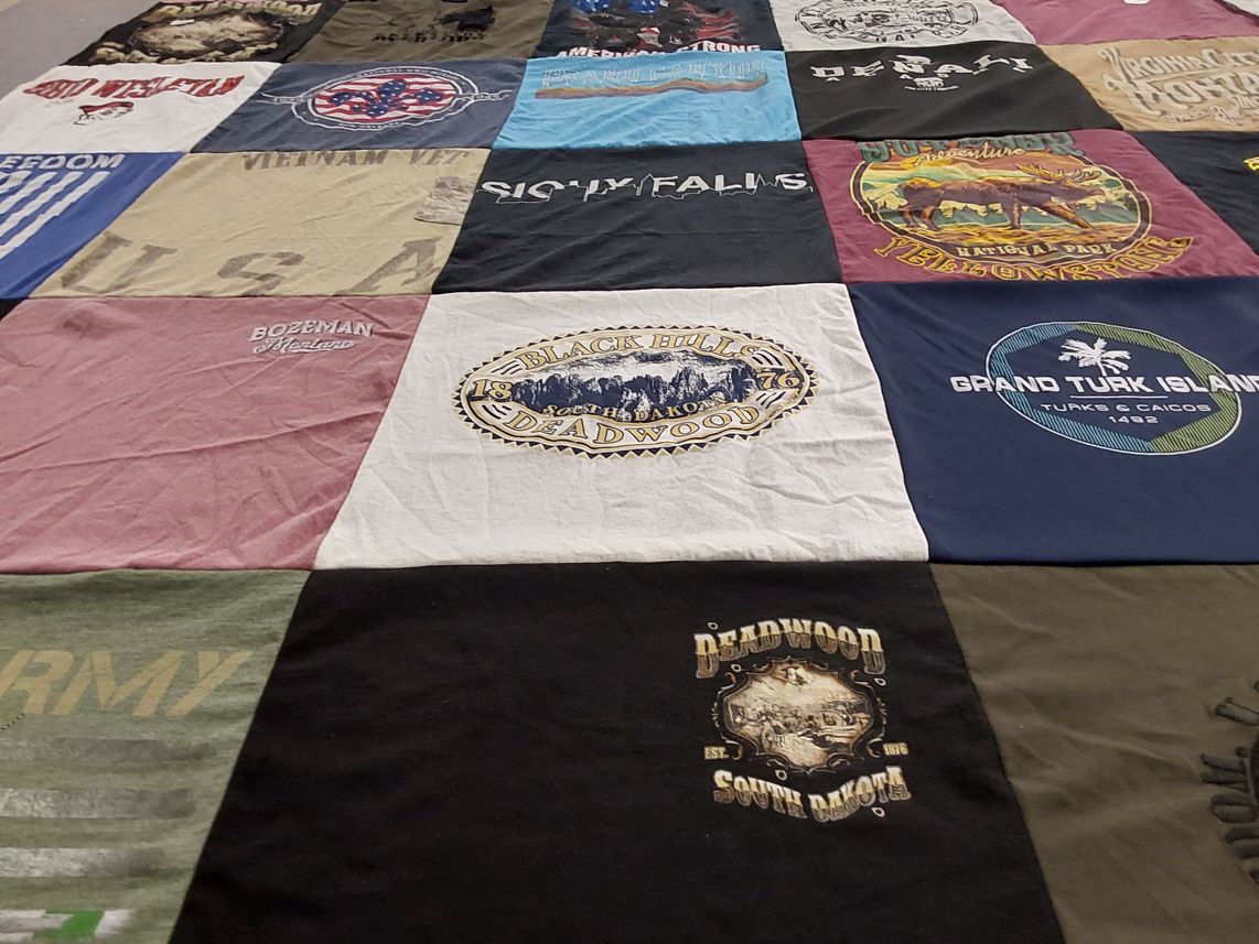 T-shirt quilt with travel, veterans themes by Teresa from FL