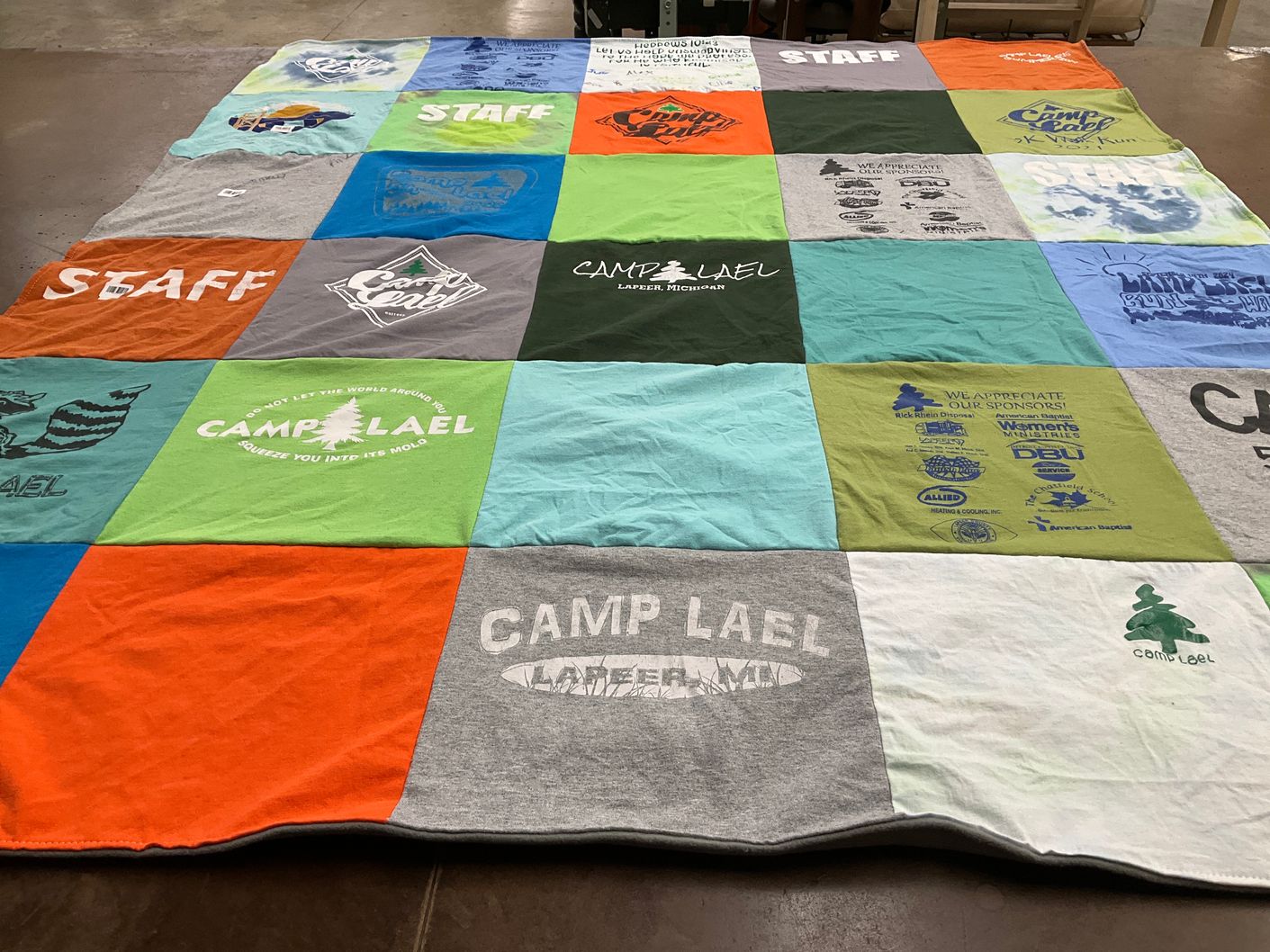T-shirt quilt with camping, outdoors themes by Joy from MI