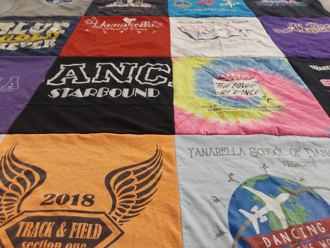 T-shirt quilt with dance, track and field themes by Kristen from NY