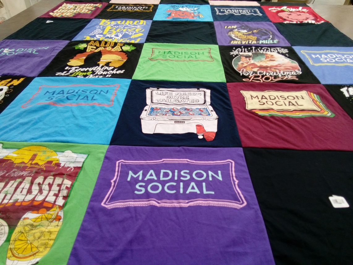 T-shirt quilt with dining, socializing themes by Debbie  from FL