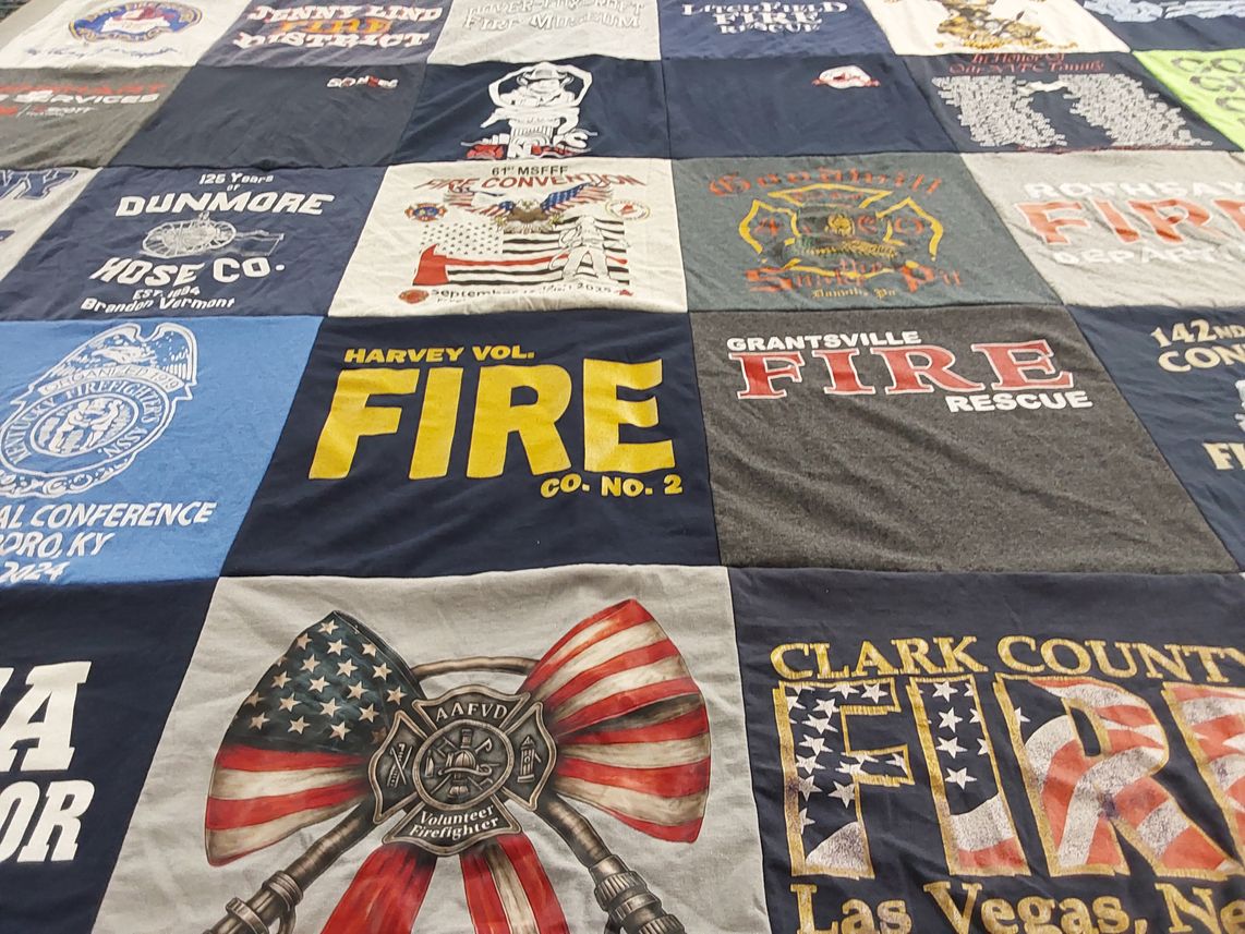 T-shirt quilt with firefighting, emergency services themes by Robert from CT