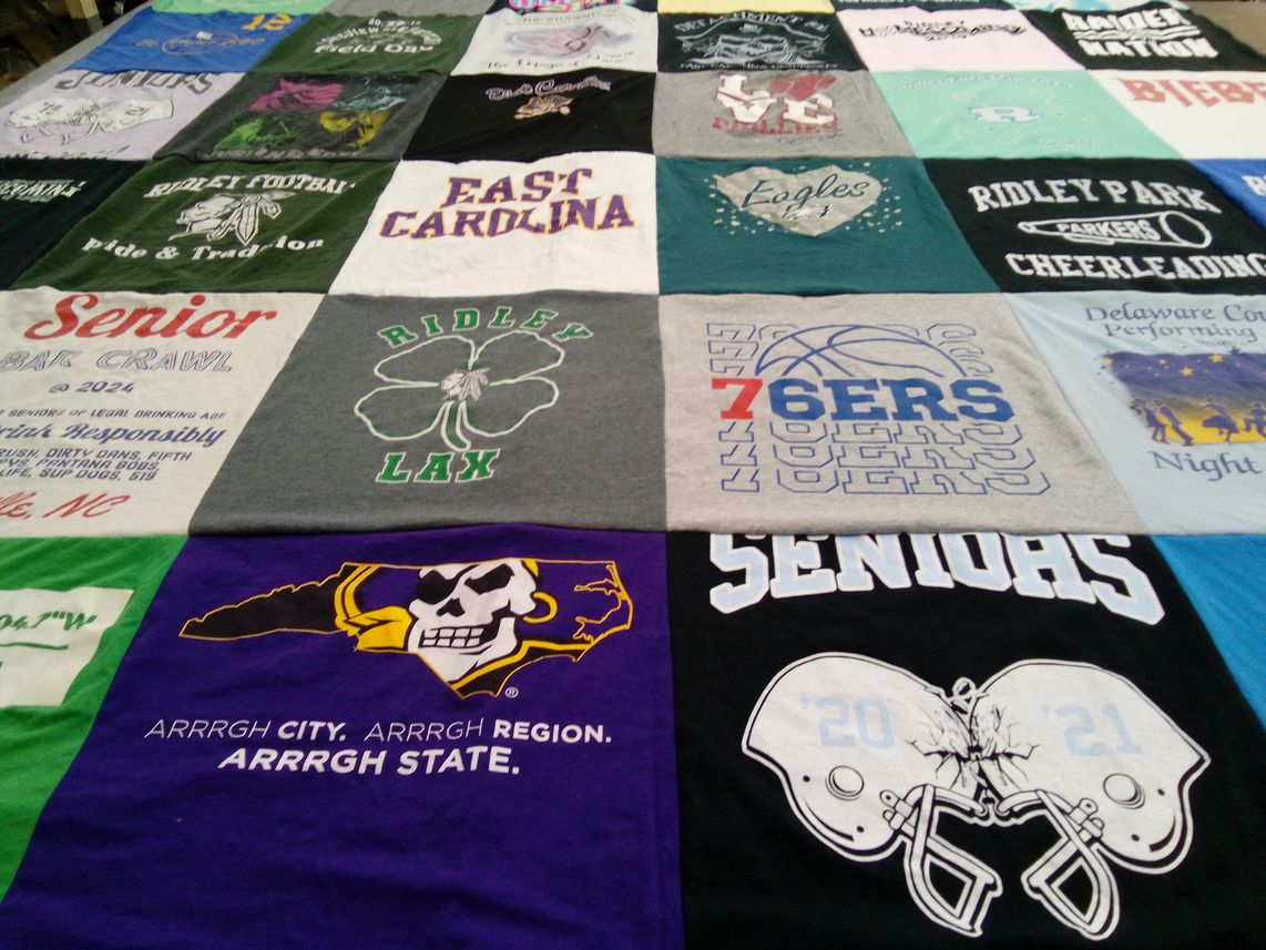 T-shirt quilt featuring philadelphia 76ers, east carolina pirates by Tammie from TX