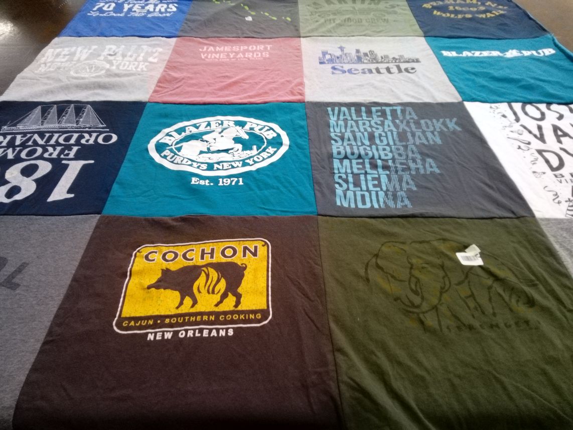 T-shirt quilt with cooking, travel themes by Mary from NY