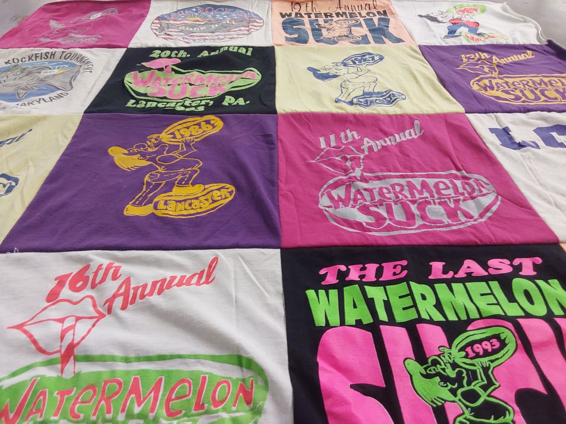 T-shirt quilt with festivals, food events themes by Sue from PA