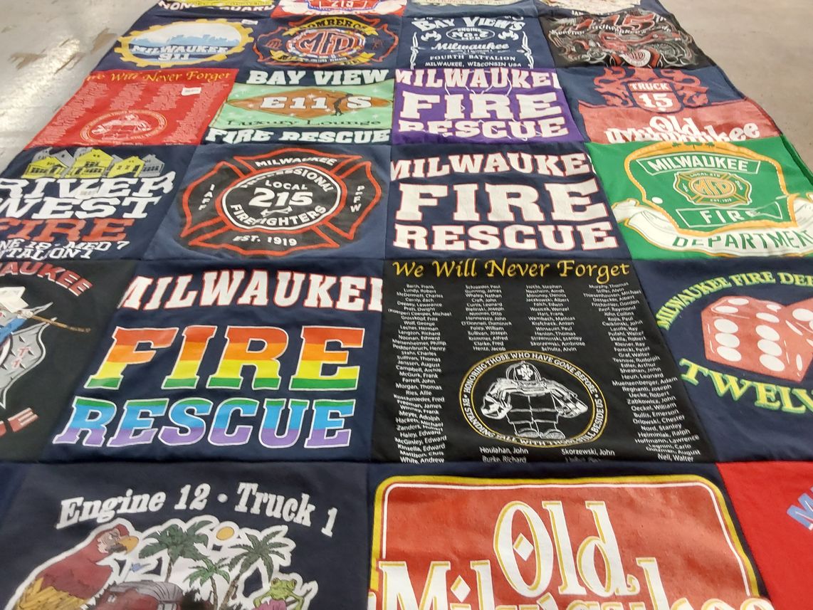 T-shirt quilt with firefighting, community service themes by Shane from WI