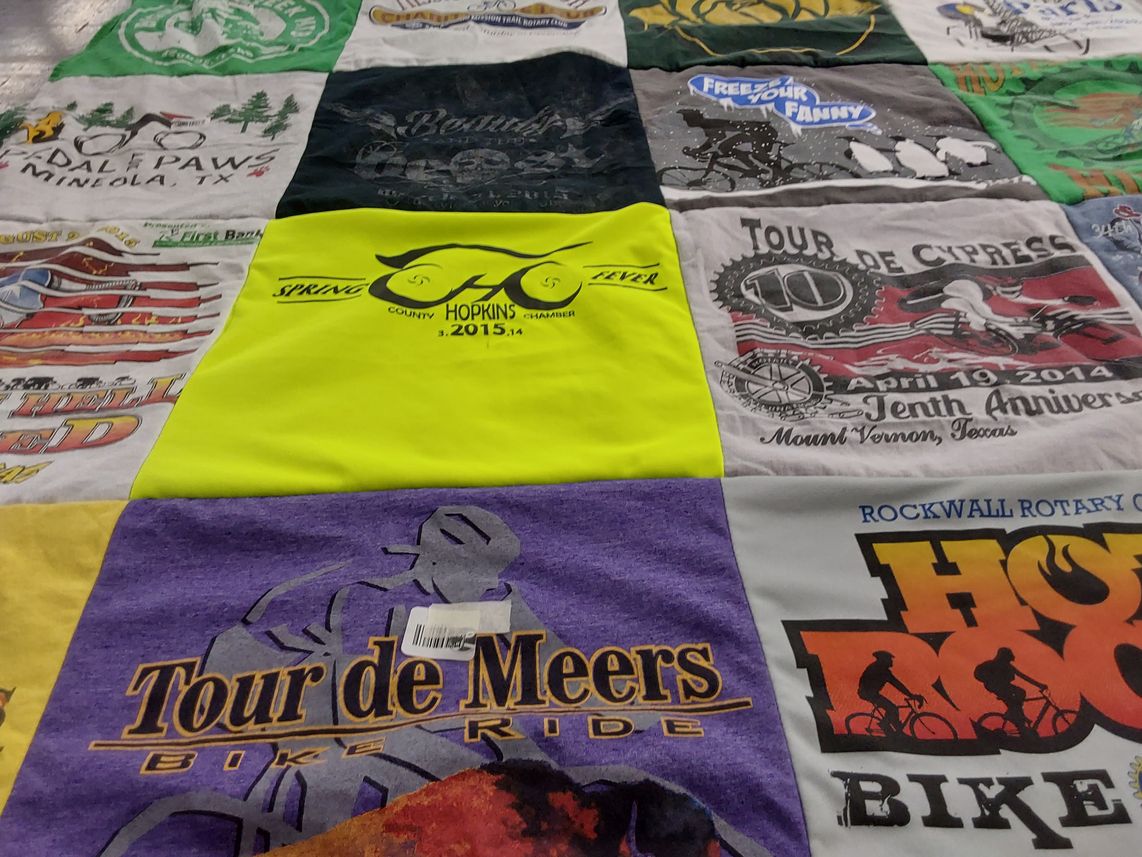 T-shirt quilt with cycling, biking themes by Jeanne from TX