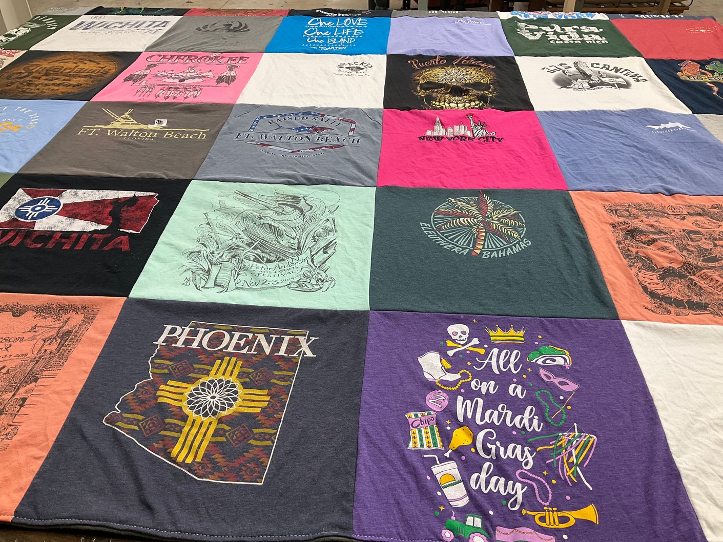 T-shirt quilt with travel, culture themes by Regina from MS