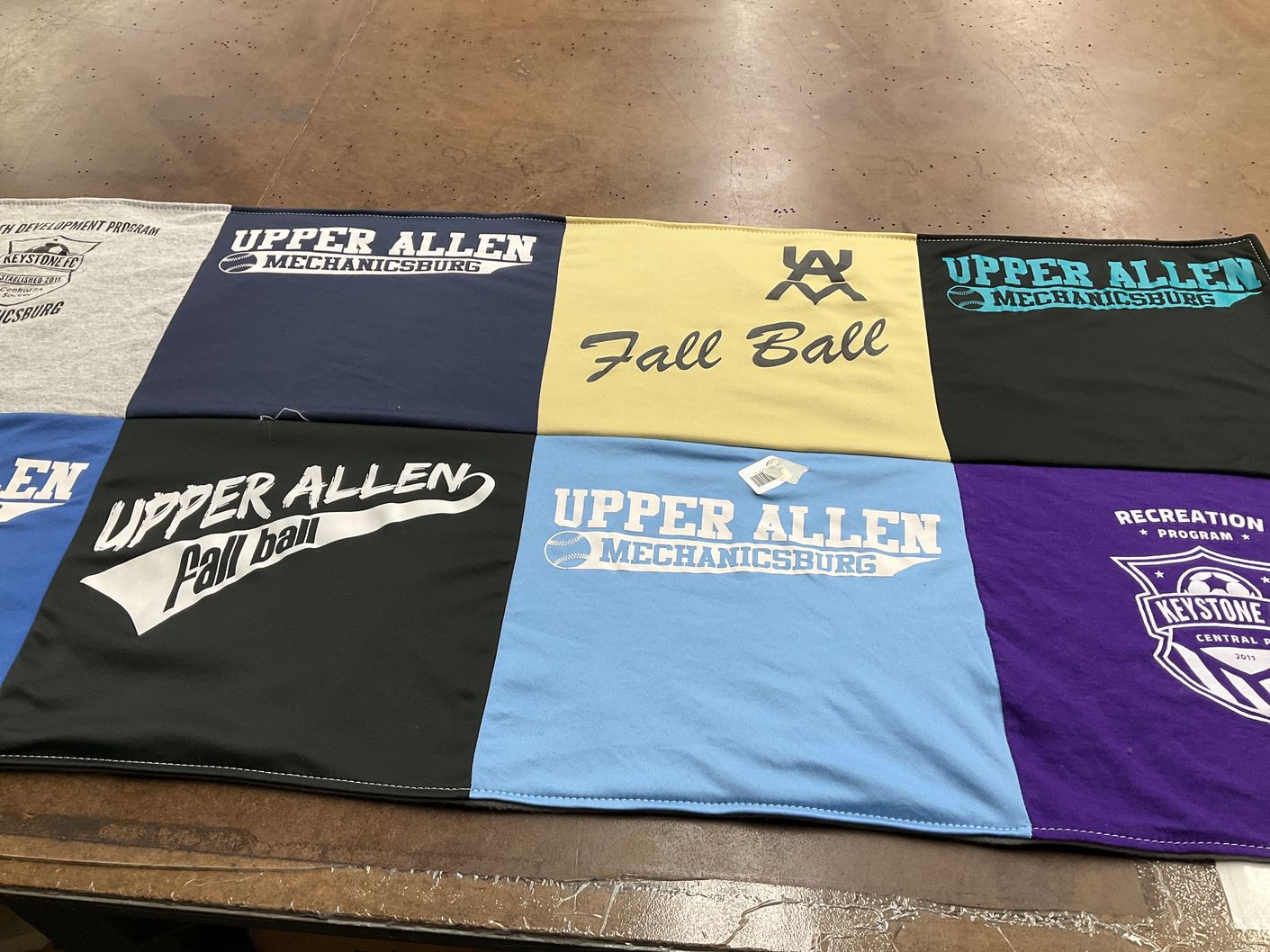T-shirt quilt with sports, youth development themes by Greg from PA