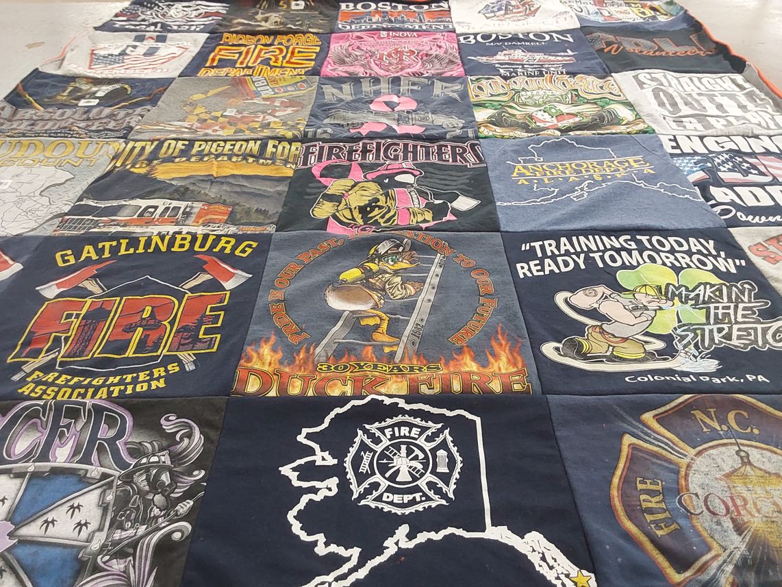 T-shirt quilt with firefighting, community service themes by James from MD