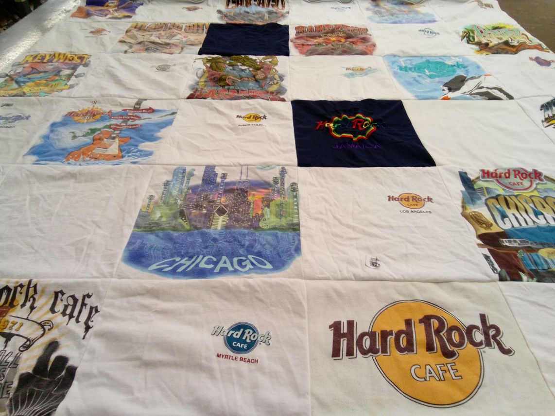T-shirt quilt with travel, music themes by Michelle from NC