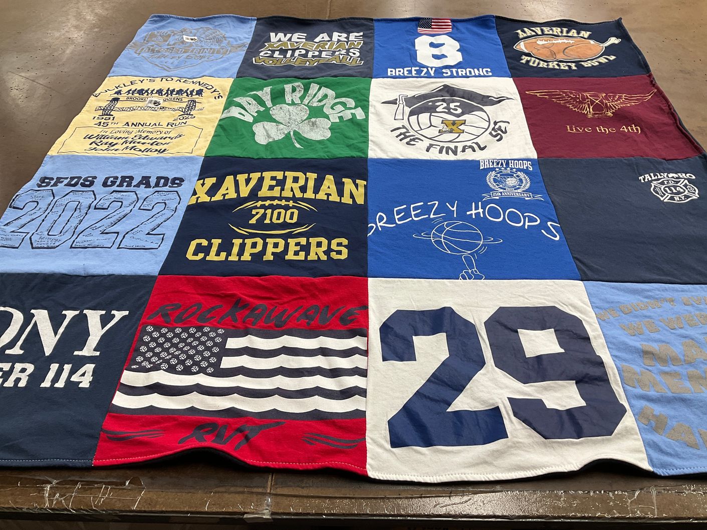T-shirt quilt from xaverian high school by Jeannie from NY