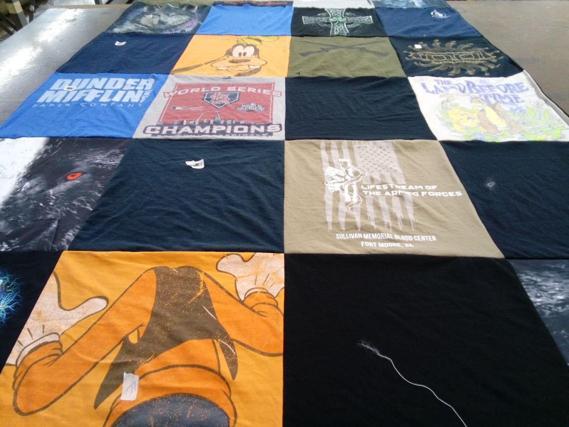 T-shirt quilt with comedy, sports themes by SPC John from NC